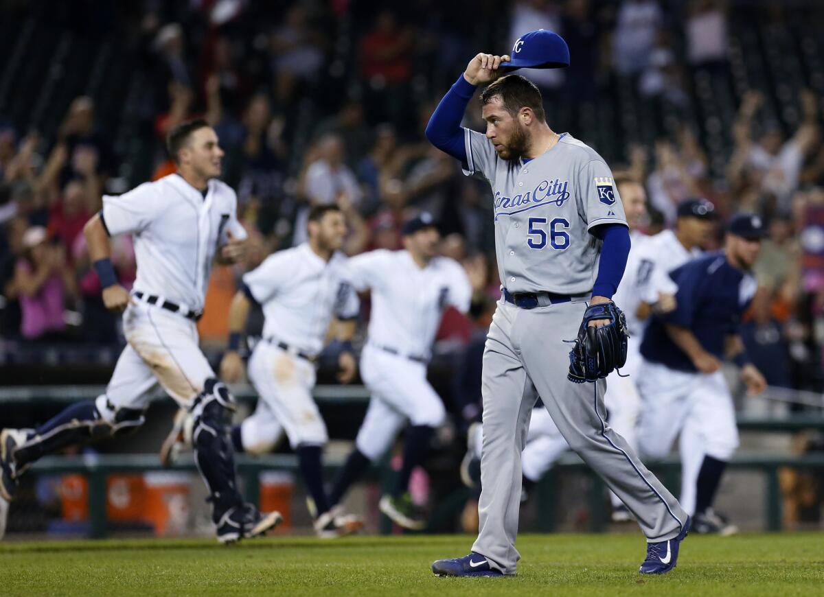 Kansas City Royals reliever Greg Holland walks off the field after giving up a game-winning RBI single to Detroit Tigers shortstop Dixon Machado during a game on Sept. 18.