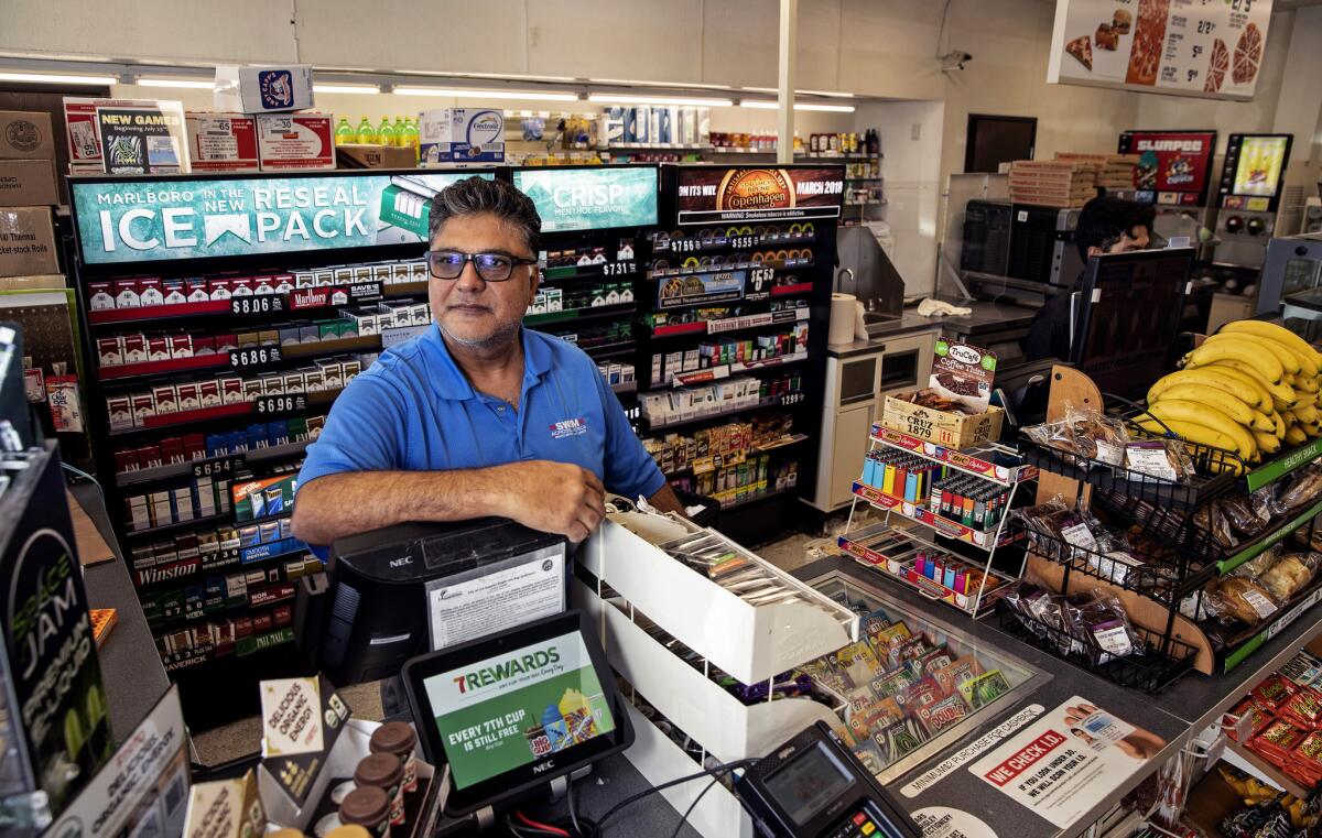 7-Eleven franchisee Jas Dhillon in his store in Reseda.