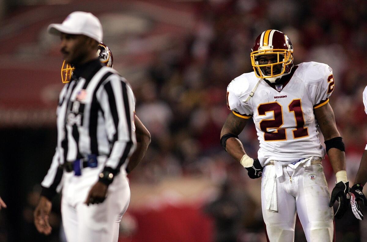 Washington safety Sean Taylor reacts after being ejected for unsportsmanlike conduct by referee Mike Carey in January 2006, after which Carey decided he couldn't in good conscience officiate another Washington game.