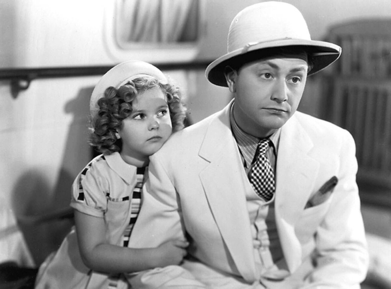 Shirley Temple in "Stowaway" with Robert Young.
