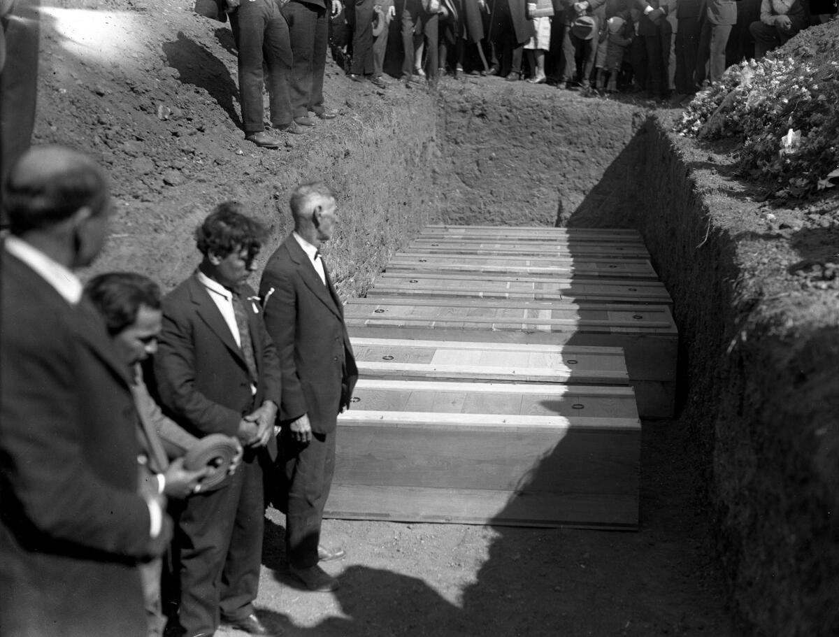 Coffins of seven victims of the dam collapsed are prepared for burial in Santa Clara Valley.