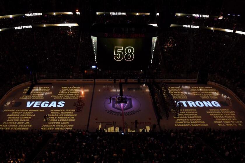 LAS VEGAS, NV - OCTOBER 10: The names of the 58 people killed at the Route 91 Harvest country music festival are projected on the ice before the Vegas Golden Knights' inaugural regular-season home opener against the Arizona Coyotes at T-Mobile Arena on October 10, 2017 in Las Vegas, Nevada. The Golden Knights honored first responders and victims of last week's mass shooting at the game. On October 1, Stephen Paddock killed 58 people and injured more than 450 after he opened fire on a large crowd at the festival. The massacre is one of the deadliest mass shooting events in U.S. history. (Photo by Ethan Miller/Getty Images) ** OUTS - ELSENT, FPG, CM - OUTS * NM, PH, VA if sourced by CT, LA or MoD **
