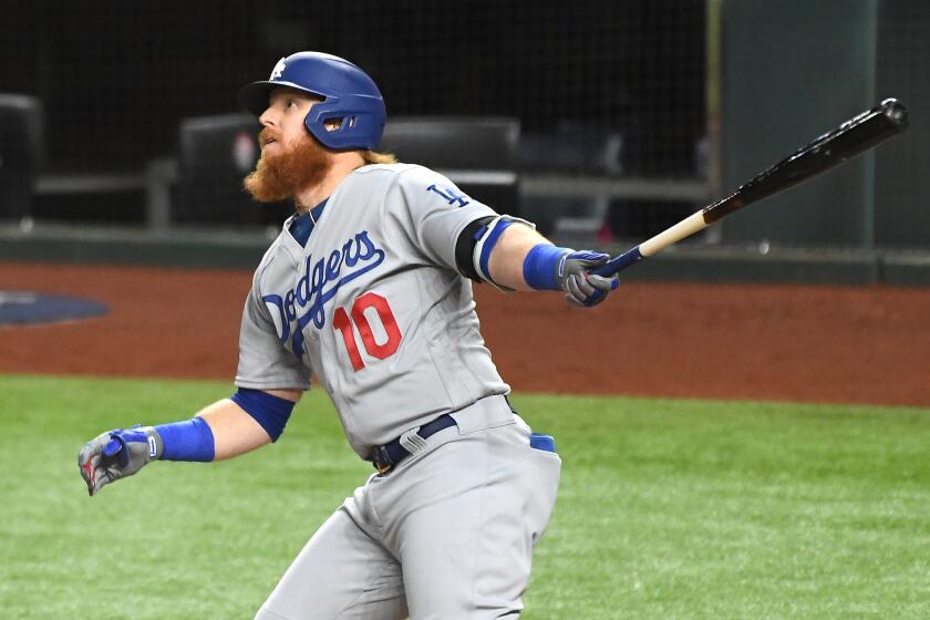 ARLINGTON, TEXAS OCTOBER 23, 2020-Dodgers Justin Turner hits a solo home run againat the Rays.