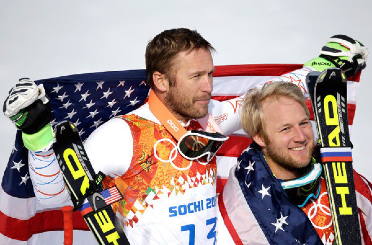 Bode Miller, left, and Andrew Weibrecht gave the U.S. a big boost when they won bronze and silver medals, respectively, in the super giant slalom on Day 9 of the Sochi Olympics.