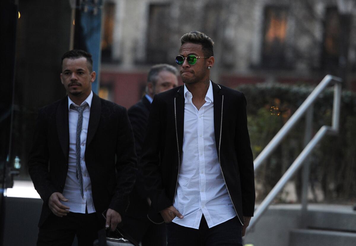 MADRID, SPAIN - FEBRUARY 02: Neymar of FC Barcelona leaves the National Court on February 2, 2016 in Madrid, Spain. Neymar was giving evidence over allegations of corruption and fraud surrounding his transfer to FC Barcelona. (Photo by Denis Doyle/Getty Images) ** OUTS - ELSENT, FPG, CM - OUTS * NM, PH, VA if sourced by CT, LA or MoD **