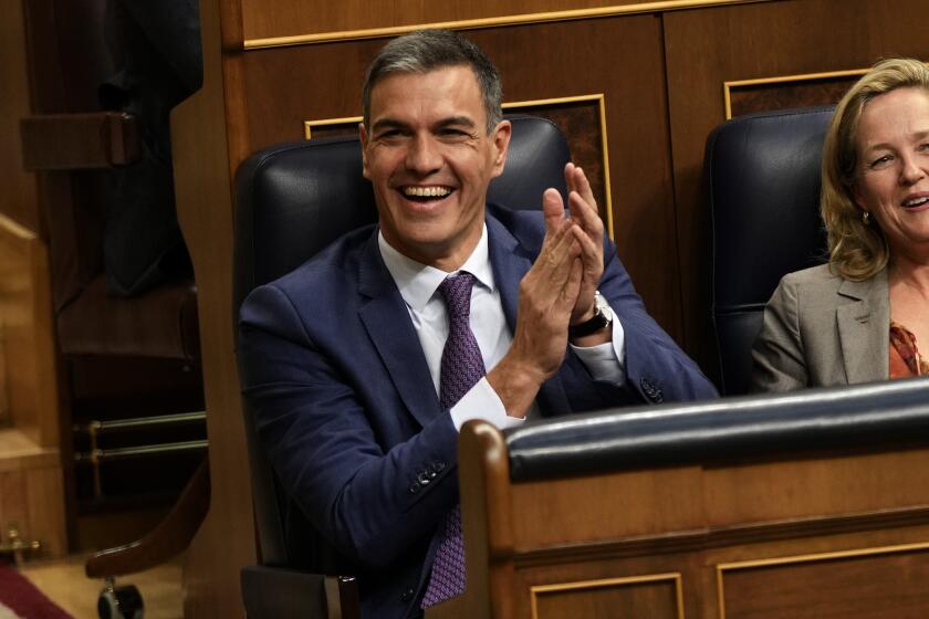 Acting Prime Minister Pedro Sanchez applauds at the Spanish parliament's lower house in Madrid, Spain on Friday, Sept. 29, 2023. The leader of Spain's conservatives on Friday failed for the second time in three days to get parliamentary support for his bid to become prime minister following his party's victory in a national election. (AP Photo/Bernat Armangue)