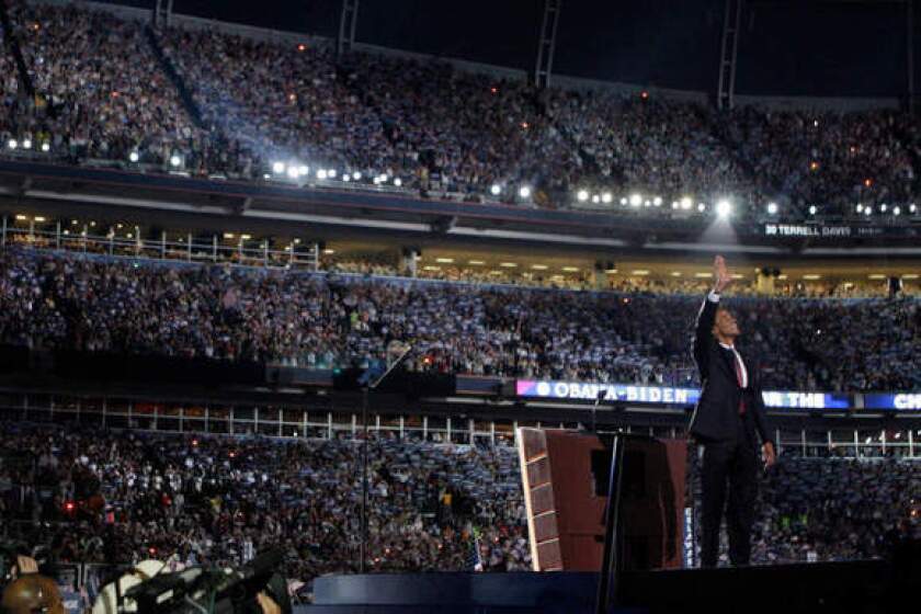 A crowd of more than 84,000 cheers for presidential nominee Barack Obama at Invesco Field on the final night of the Democratic convention in Denver on Aug. 28, 2008.