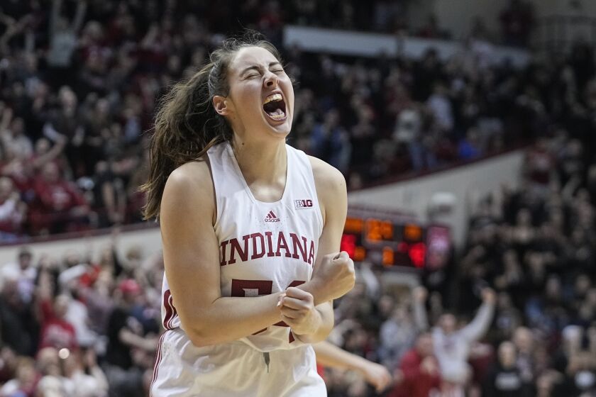 Indiana's Mackenzie Holmes reacts after making a basket and getting fouled during the second half of an NCAA college basketball game against Ohio State, Thursday, Jan. 26, 2023, in Bloomington, Ind. (AP Photo/Darron Cummings)