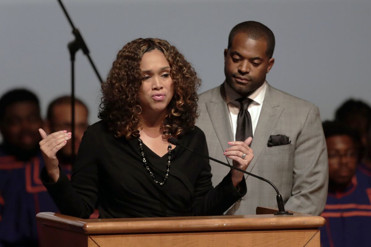 FILE - In this Wednesday, Oct. 23, 2019 file photo, Maryland State Attorney Marilyn Mosby, left, speaks while standing next to her husband, Maryland Assemblyman Nick Mosby, during a viewing service for the late U.S. Rep. Elijah Cummings at Morgan State University in Baltimore. Baltimore’s ethics board ordered Nick Mosby, the city council president Thursday, May 13, 2022 to stop accepting money from a legal defense fund that took donations from at least two city contractors. (AP Photo/Julio Cortez, File)