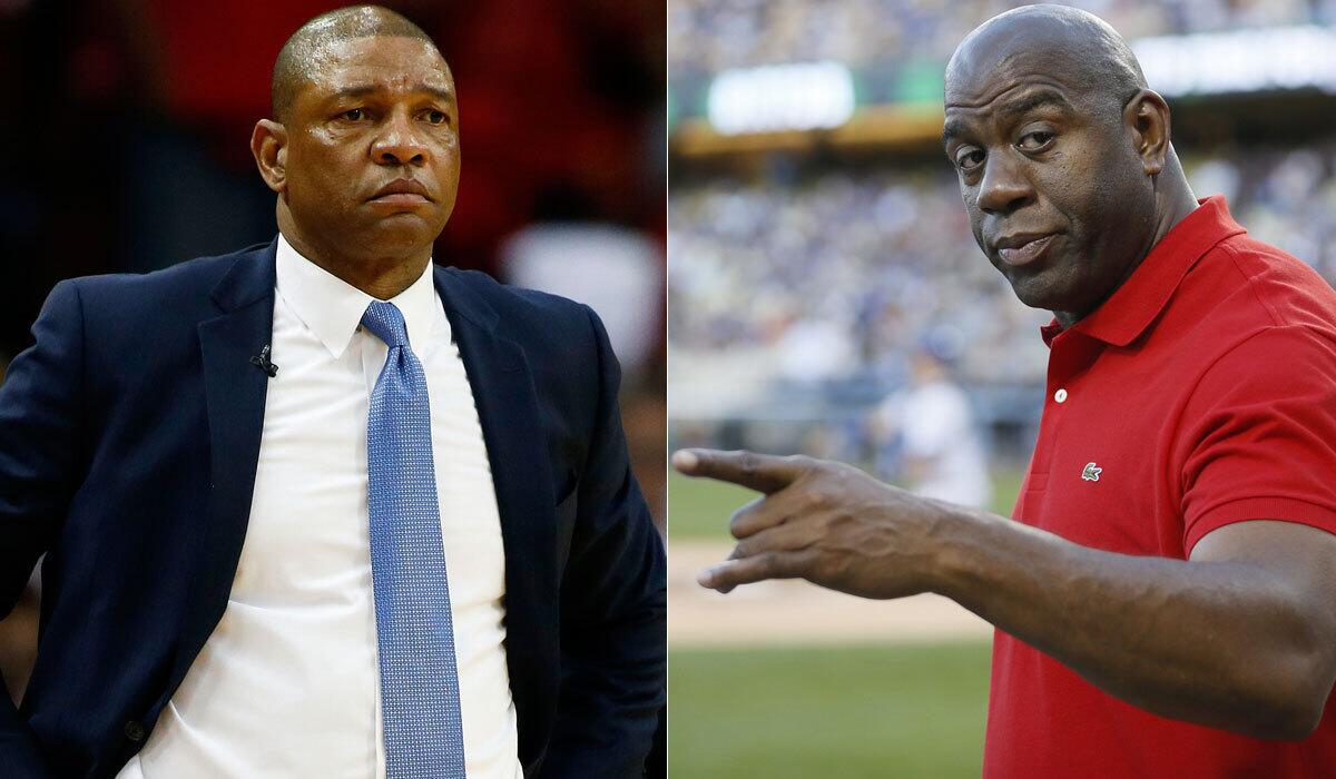 Magic Johnson, right, had some critical words for Doc Rivers' Clippers after the team's playoff collapse.