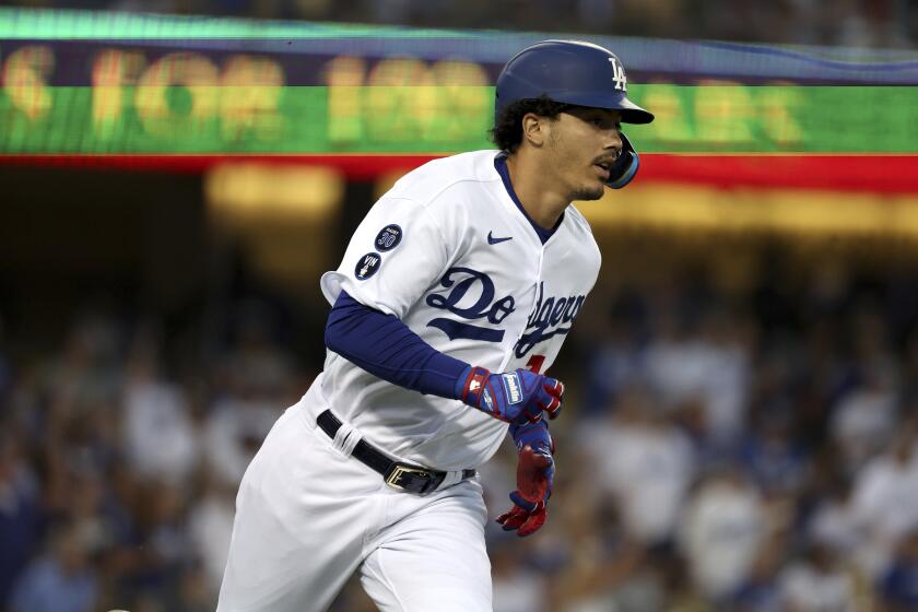 Los Angeles Dodgers Miguel Vargas runs the bases after hitting a two-run home run against the St. Louis Cardinals during the second inning of a baseball game Saturday, Sept. 24, 2022, in Los Angeles. Dodgers won 6-2. (AP Photo/Raul Romero Jr.)