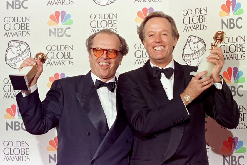 (FILES) In this file photo taken on January 18, 1998 Actors Jack Nicholson (L) and Peter Fonda (R) hold their Golden Globe awards for Best Actor at the 55th Annual Golden Globe Awards in Beverly Hills. Nicholson won his award in the Comedy or Musical category for his role in "As Good As It Gets" and Fonda for his role in the Drama category for his role in "Ulee's Gold." - Peter Fonda died on friday August 16, 2019. He was 79. (Photo by HAL GARB / AFP)HAL GARB/AFP/Getty Images ** OUTS - ELSENT, FPG, CM - OUTS * NM, PH, VA if sourced by CT, LA or MoD **