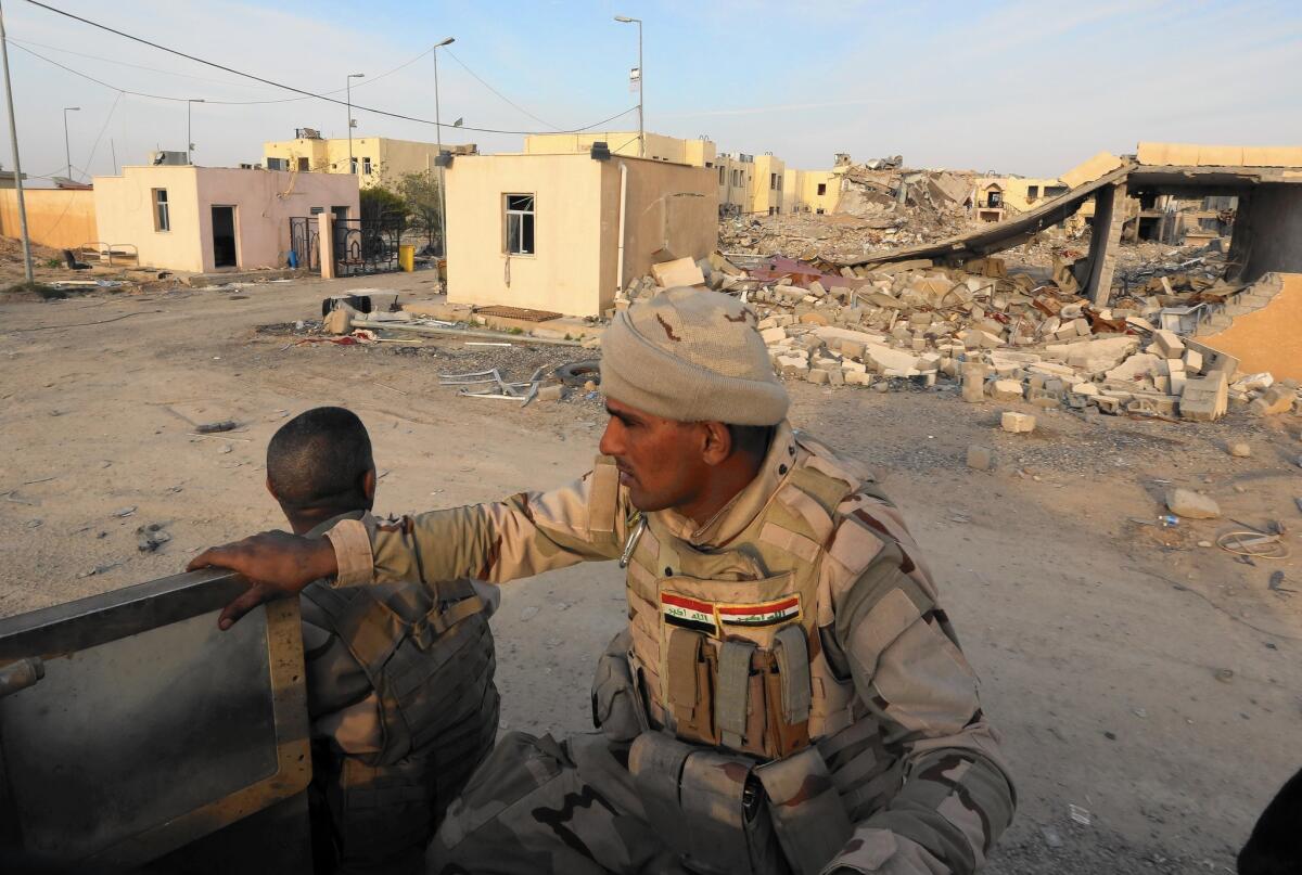 Iraqi security forces and Shiite Muslim fighters are deployed in an operation in Tikrit, north of Baghdad.