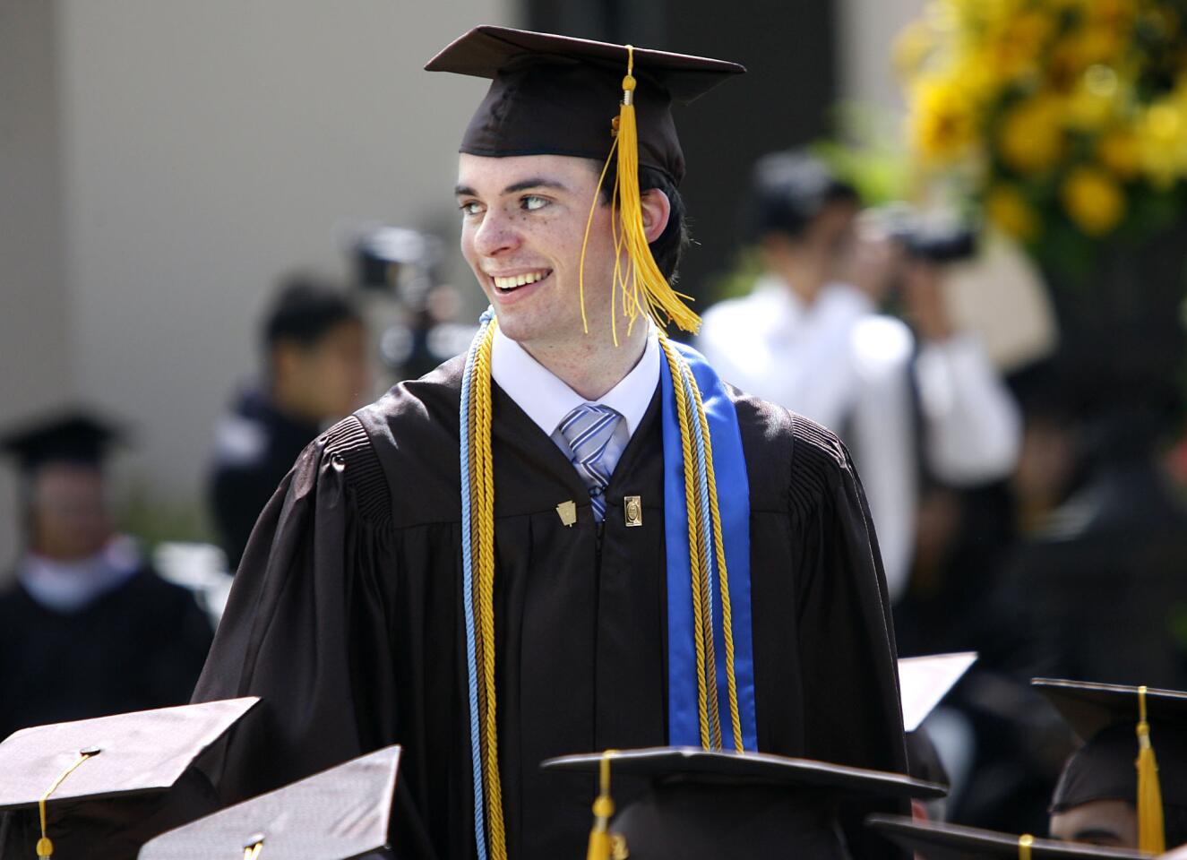 Jeffrey Thomas Brown looks back at the crowd after receiving a scholastic award during the 63rd Annual Commencement Exercises at St. Francis High School in La Canada Flintridge on Saturday, May 26, 2012.