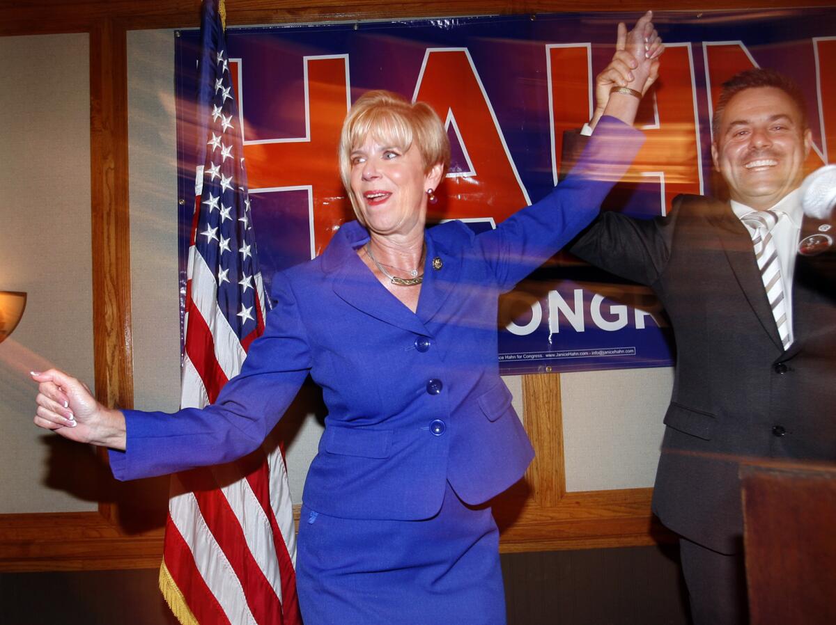 Congresswoman Janice Hahn is congratulated by L.A. City Councilman Joe Busciano on election night in 2012.