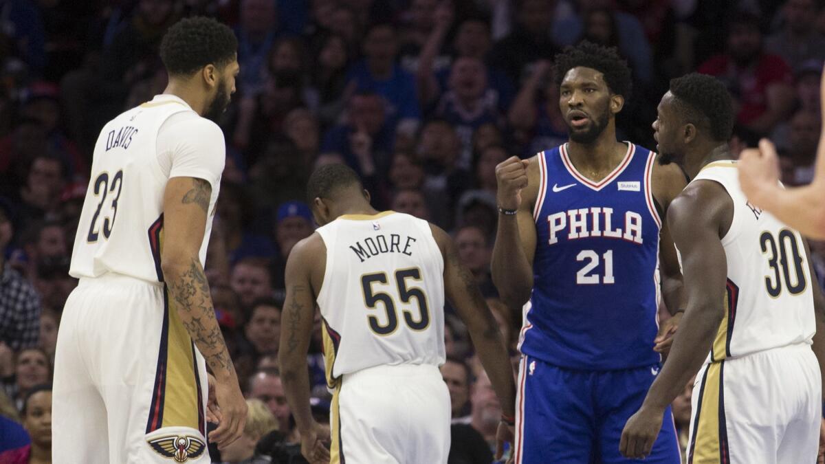 Joel Embiid reacts to Anthony Davis' missed free throw with 2.5 seconds left.