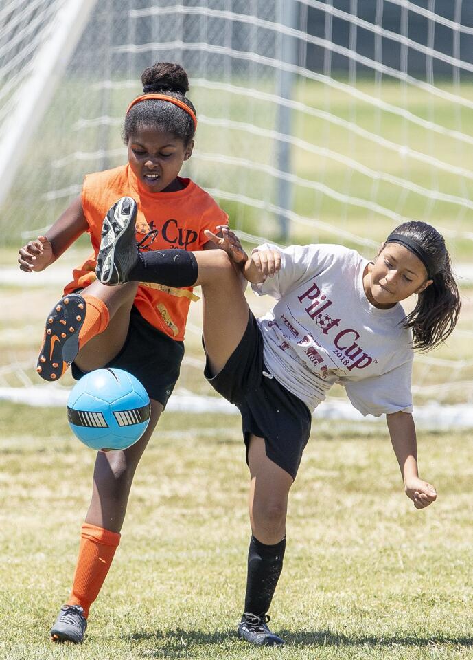 Photo Gallery: A girls' Bronze Division quarterfinal match at the Daily Pilot Cup