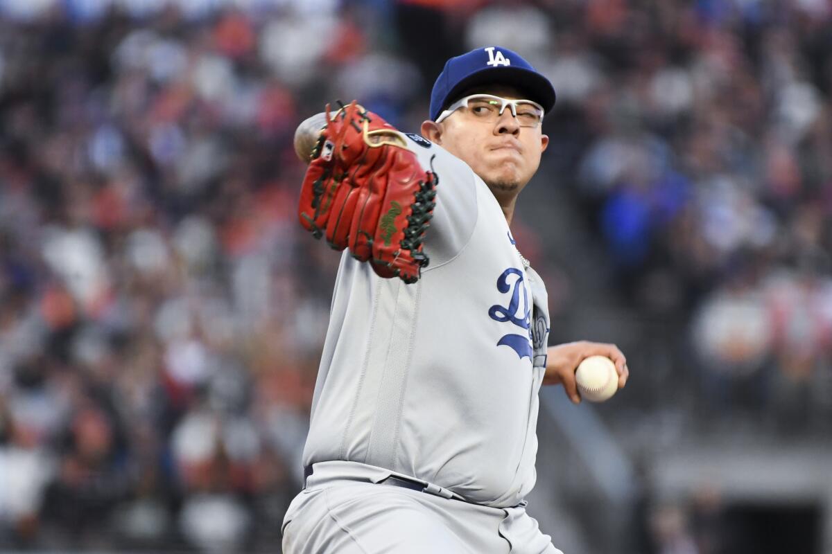 Dodgers pitcher Julio Urías delivers during the first inning.