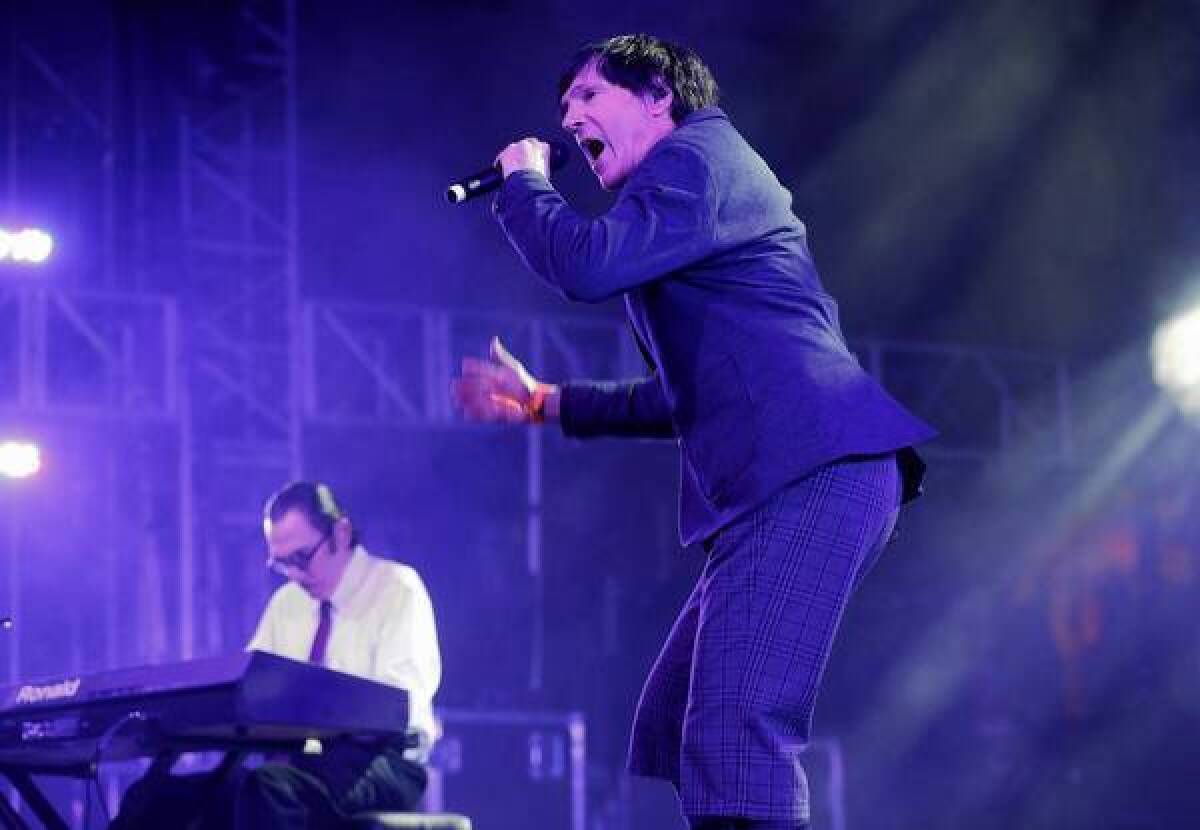 Russell Mael of the band Sparks with brother Ron perform at Coachella.