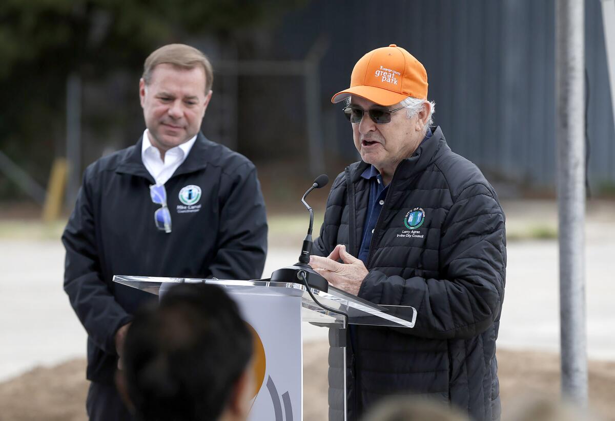 Councilman Larry Agran, right, makes comments at a groundbreaking ceremony for the Great Park in Irvine on Tuesday.