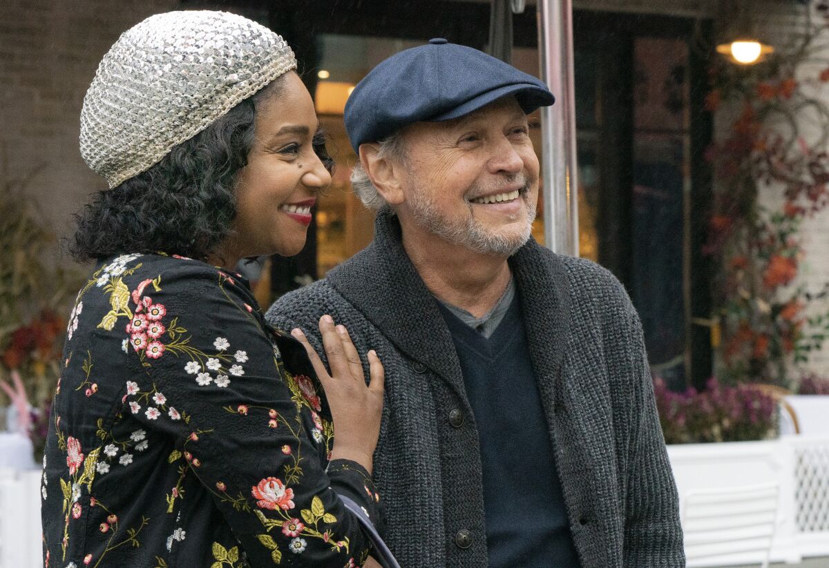 This image released by Sony Pictures shows Tiffany Haddish, left, and Billy Crystal in a scene from "Here Today." (Cara Howe/Sony Pictures via AP)