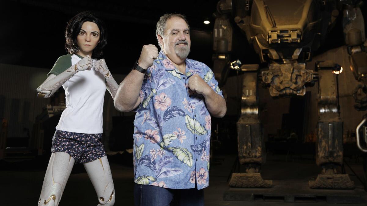 "Avatar" and "Alita: Battle Angel" producer Jon Landau poses with a concept model of Alita inside Lightstorm Entertainment at Manhattan Beach Studios.