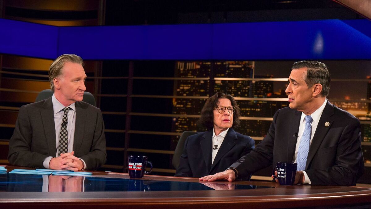 Guest Rep. Darrell Issa, right, speaks on a panel with host Bill Maher, left, and guest Fran Lebowitz, contributing editor at Vanity Fair, during HBO's "Real Time with Bill Maher" in Los Angeles.