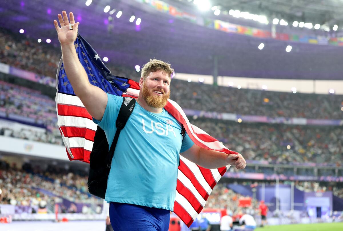 American Ryan Crouser competes in the men's shot put final at the 2024 Summer Olympics