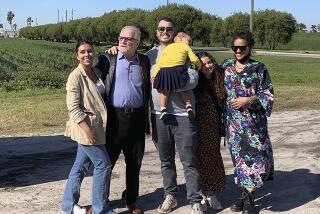 Richard DeLisi, 71, is joined by his son Rick, daughter-in-law Vida, right, and three granddaughters.