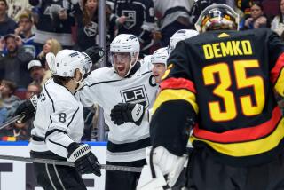 VANCOUVER, CANADA - FEBRUARY 29: Kevin Fiala #22 of the Los Angeles Kings is congratulated.
