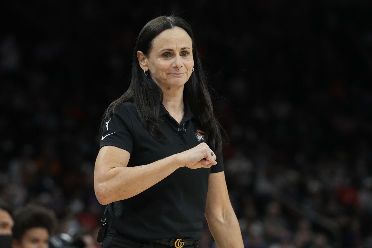 FILE - Phoenix Mercury head coach Sandy Brondello gestures during the first half of Game 2 of basketball's WNBA Finals against the Chicago Sky, Wednesday, Oct. 13, 2021, in Phoenix. The New York Liberty hired Sandy Brondello to be their new coach Friday, Jan. 7, 2022. (AP Photo/Rick Scuteri, File)