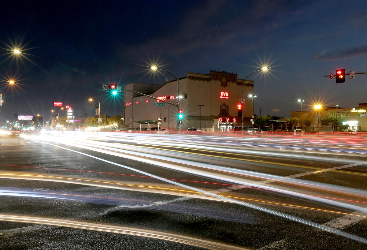 Traffic streams past the old Golden Gate Theater on Whittier Boulevard in East L.A.
