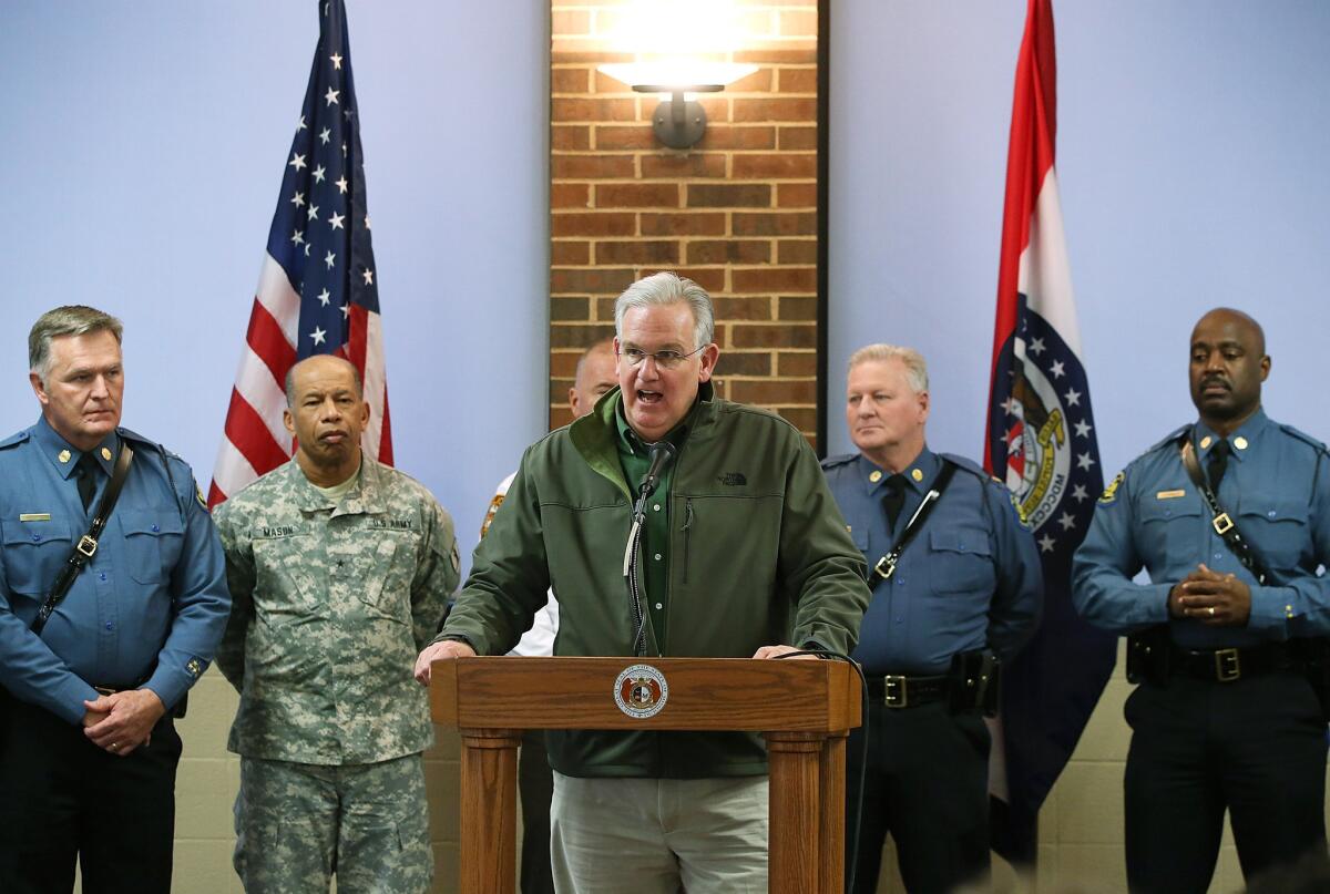 Missouri Gov. Jay Nixon speaks during a news conference Tuesday in St. Louis, Mo. Nixon discussed the law enforcement and national guard response to widespread rioting following the decision by a St. Louis County grand jury to not indict Officer Darren Wilson in the shooting death of Michael Brown in August.