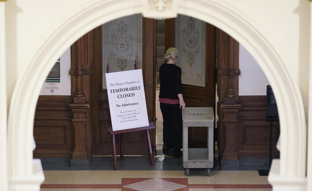 A "temporarily closed" sign stands outside doors.