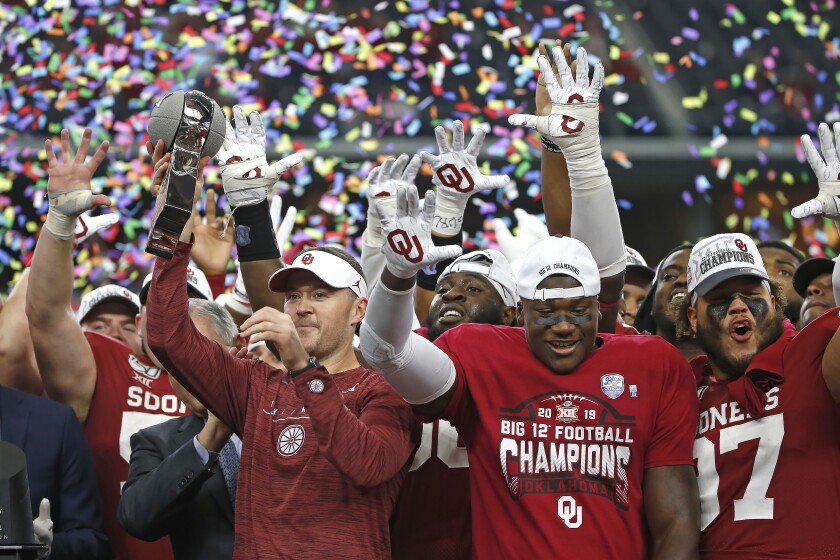 Oklahoma coach Lincoln Riley and the Sooners celebrate after defeating Baylor in the 2019 Big 12 championship 