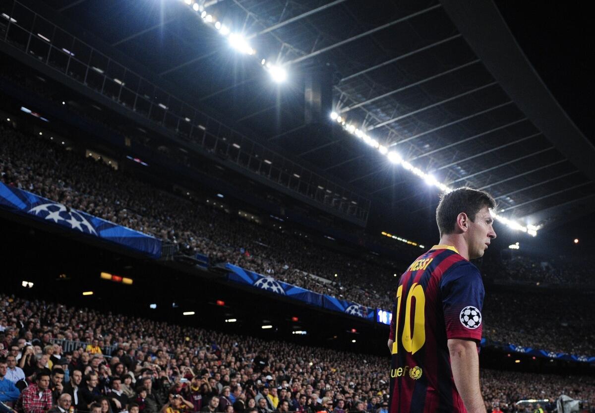 Barcelona's Lionel Messi waits to take a corner kick during a UEFA Champions league football match against AC Milan Nov. 6.