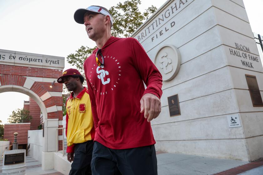 Los Angeles, CA, Friday, July 28, 2013 - USC Trojans head coach Lincoln Riley on his way to practice at Dedeaux Field. (Robert Gauthier/Los Angeles Times)