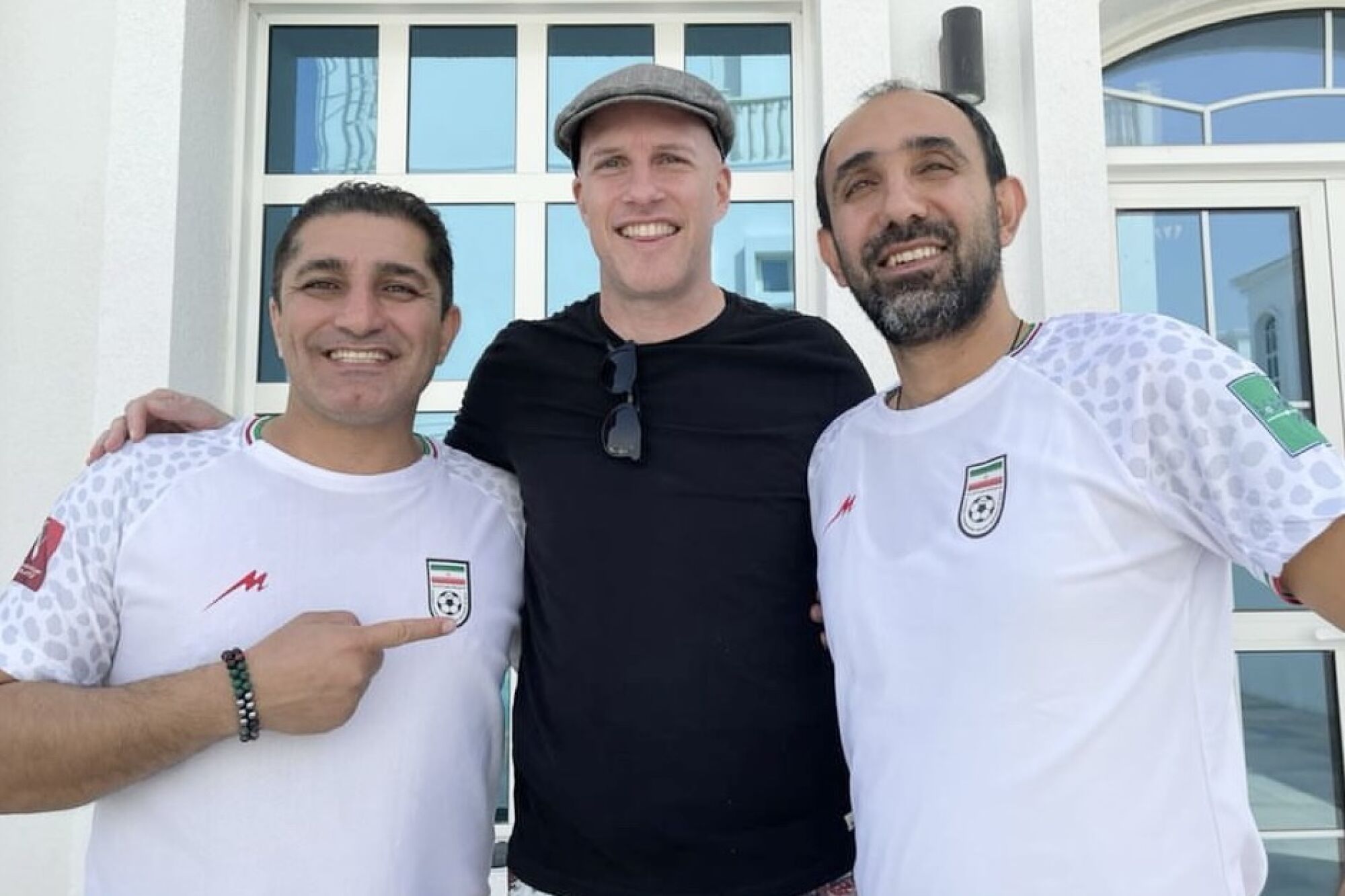 Soccer journalist Grant Wahl, center, with Iranian soccer fans 