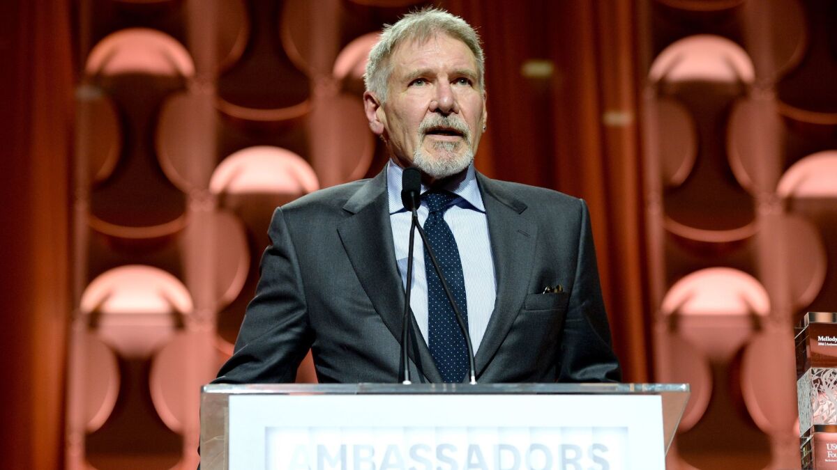 Harrison Ford speaks during the Ambassadors for Humanity Gala.