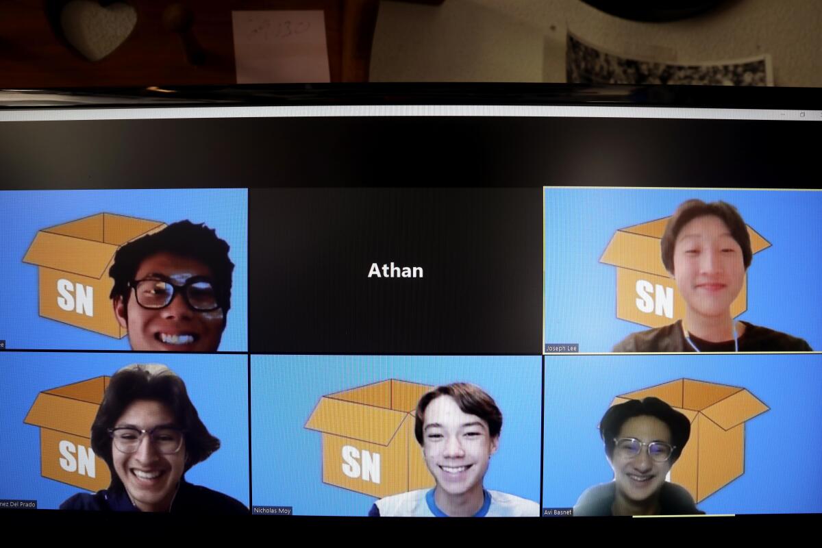 (Clockwise from upper left) Valencia High School students, Hayden Lee, 17, Joseph Lee, 16, Fabio Nunez Del Prada, 16, Nicholas Moy, 16, and Avi Basnet, 16, appear for a portrait shoot on a computer screen using zoom. The students wrote a computer program, SupplyNeighbor.com, that allows people to plug in their zip code, then communicate anonymously with people in their area whom they can ask for help, advice, trade supplies.