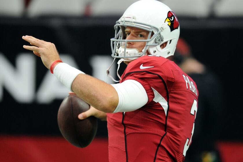 Arizona quarterback Carson Palmer, a former Trojan, has agreed to a three-year contract extension with the Cardinals reportedly worth $50 million.