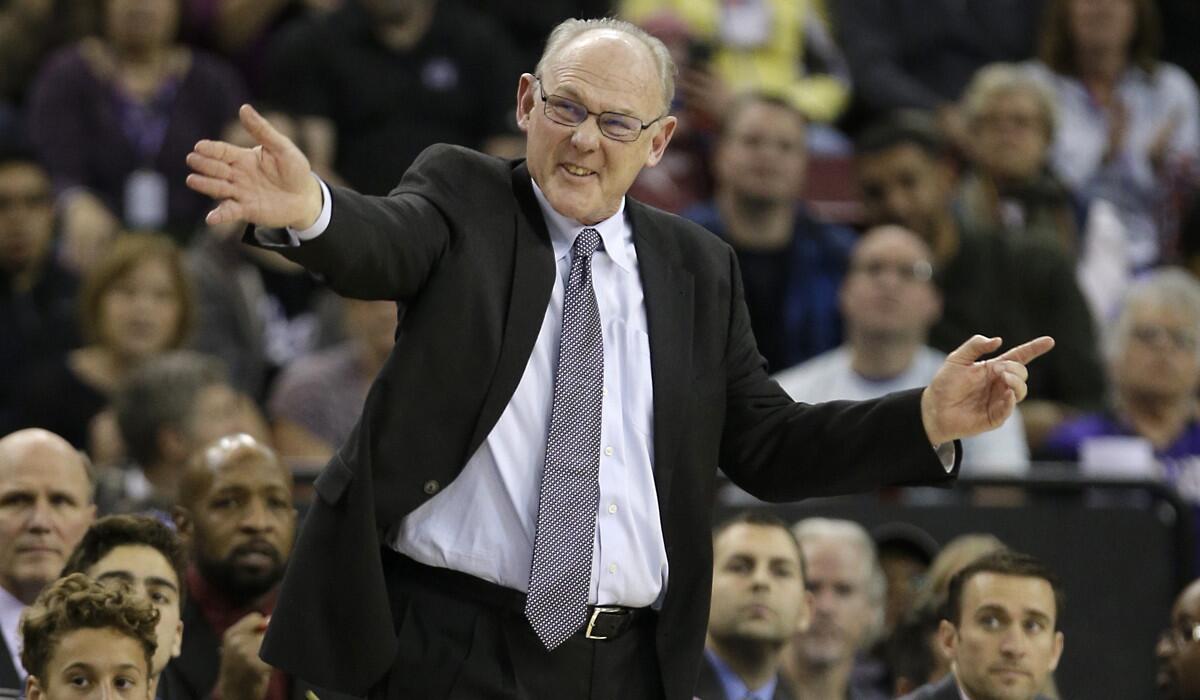 Sacramento Kings head coach George Karl directs his team during the second half against the Phoenix Suns on Saturday.
