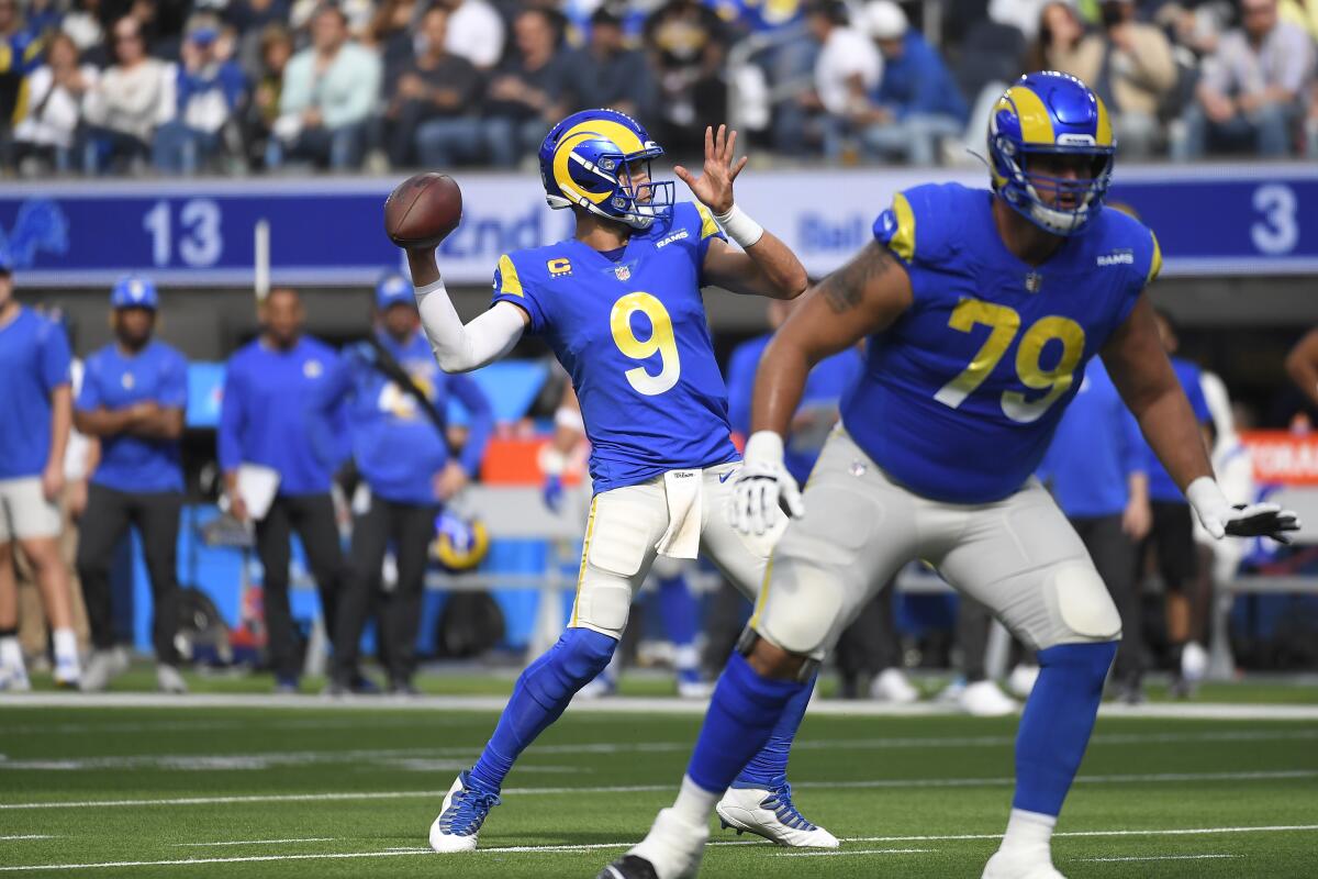 Rams quarterback Matthew Stafford throws a pass during the first half.