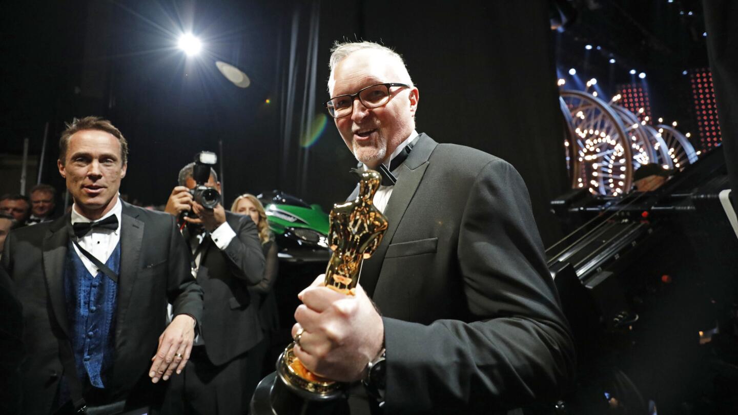 Lee Smith after winning for editing for "Dunkirk," from backstage at the 90th Academy Awards on Sunday.