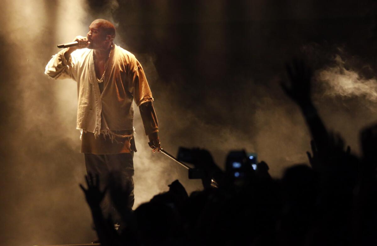 Kanye West performs during FYF Fest on Saturday.