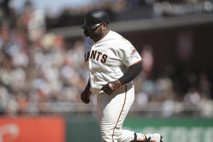 San Francisco Giants' Pablo Sandoval runs off the field after grounding out in the seventh inning of a baseball game against the San Diego Padres Sunday, Sept. 1, 2019, in San Francisco. (AP Photo/Ben Margot)