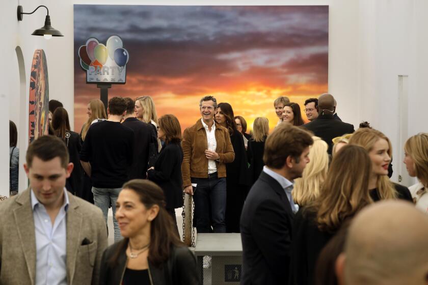 The Frieze Los Angeles crowd clusters in conversation during a previous year of the art fair.  