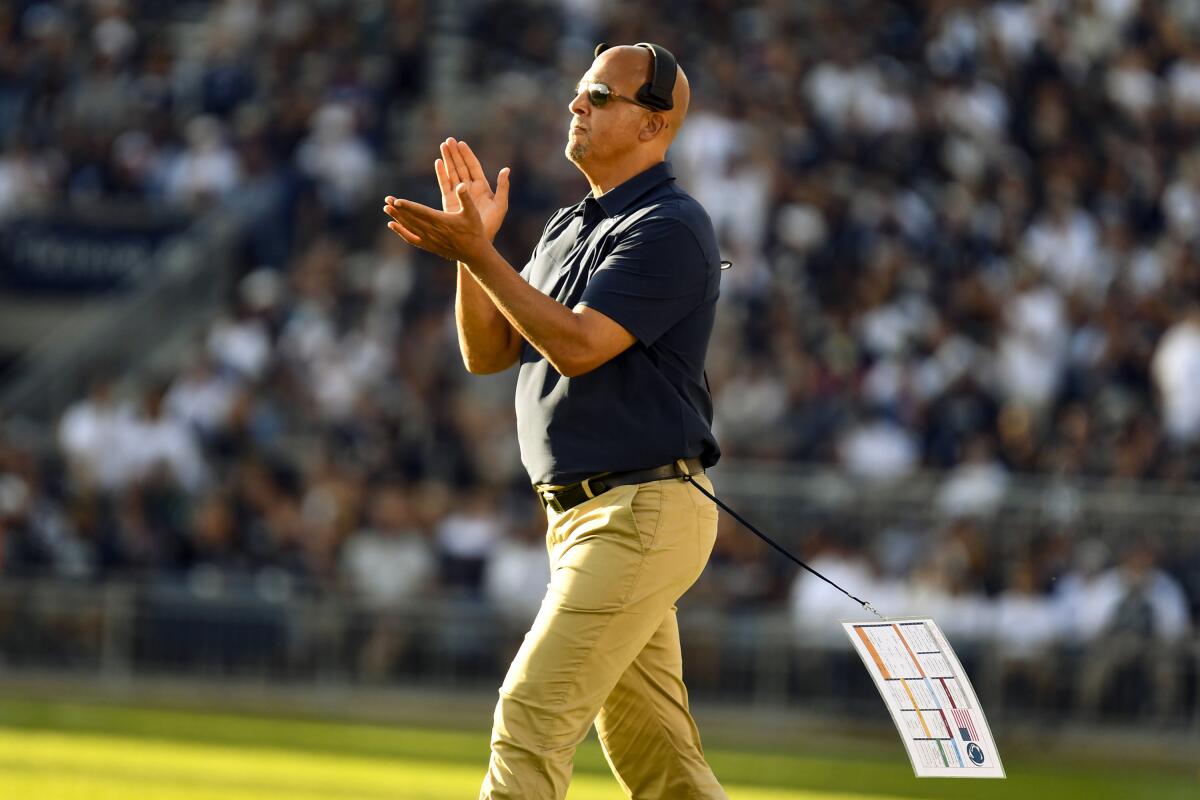 Penn State head coach James Franklin celebrates a score against Ball State during an NCAA college football game in State College, Pa., on Saturday, Sept. 11, 2021. Penn State defeated Ball State 44-13. (AP Photo/Barry Reeger)