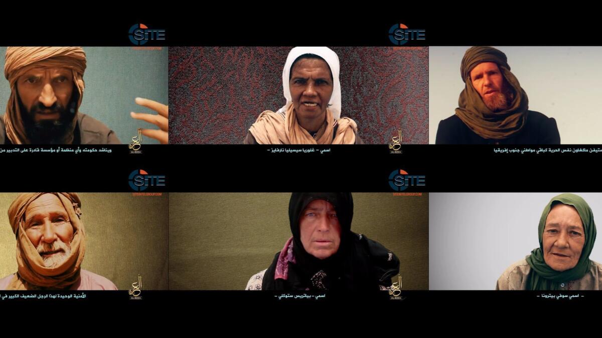 Video grabs provided by the SITE Intelligence Group show six hostages held by an Al Qaeda-linked group in Mali.