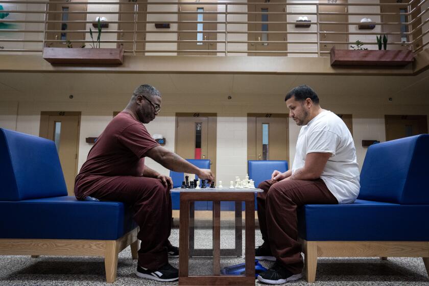 CHESTER, PA - MARCH 09: Inmates play a round of Chess in the Little Scandinavia unit at SCI Chester on Thursday, March 9, 2023 in Chester, PA. The unit is designed to give prisoners a sense of autonomy over their space.